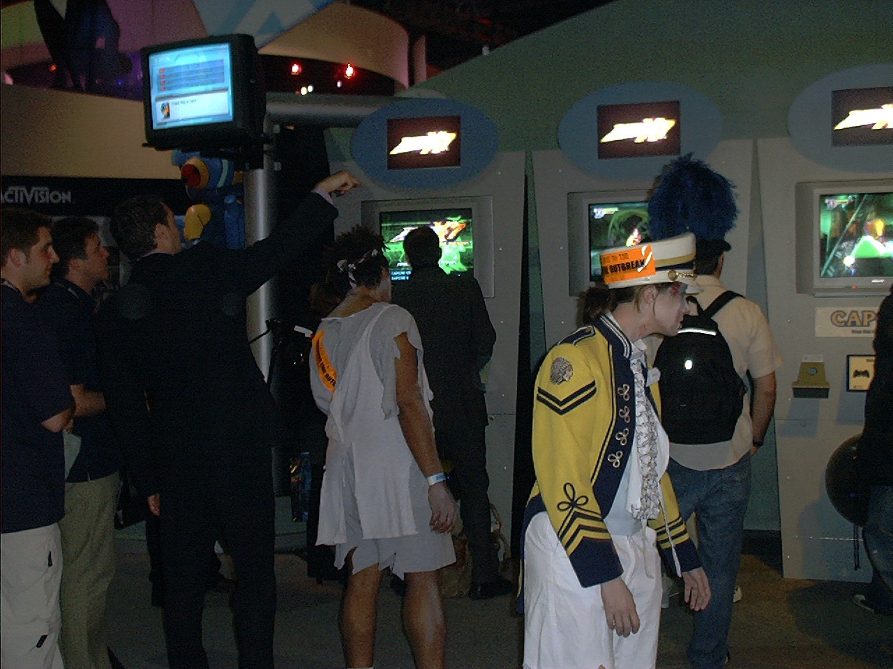 The Capcom booth, with *surprise!* zombies walking among the crowd.