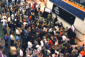 Overflow from IDSA President Doug Lowenstein's State of the Industry Report watch outside monitors.